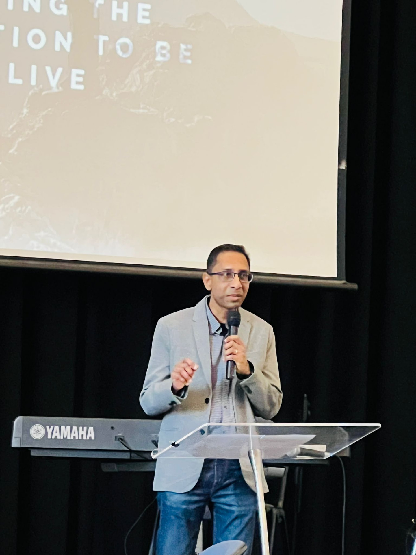 Gary Gopinathan, Founder of Innovate Forge Academy, speaking at a leadership event